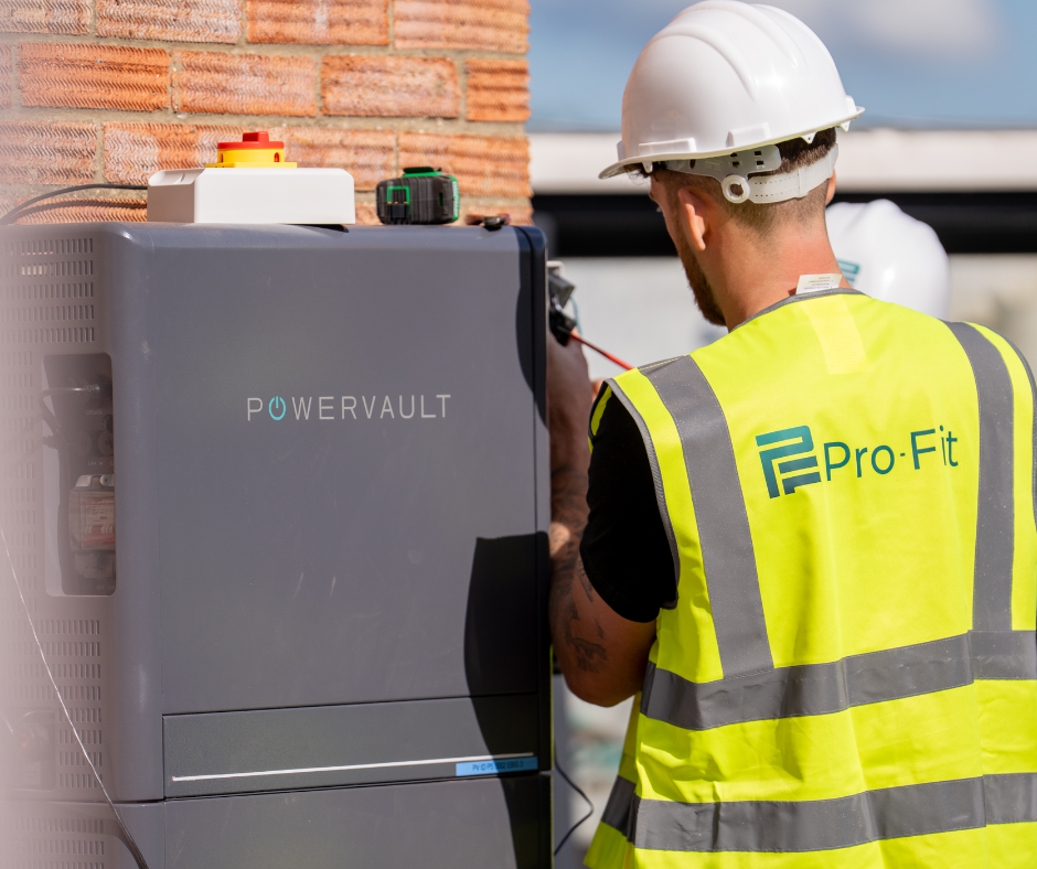 A Pro-Fit engineer commissioning equipment inside a customer's home